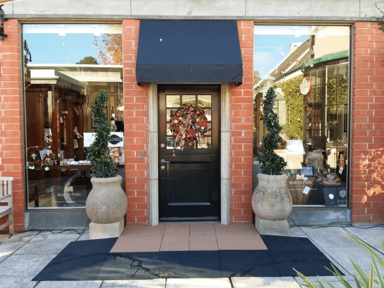 Rubber threshold ramp for a business