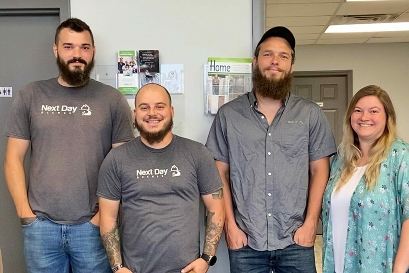 group photo of the next day access knoxville team