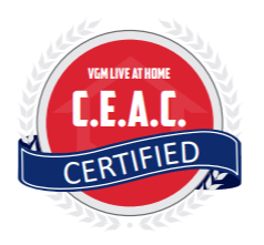 Circular red, white, and blue logo certifying VGM LIVE AT HOME C.E.A.C. CERTIFIED.