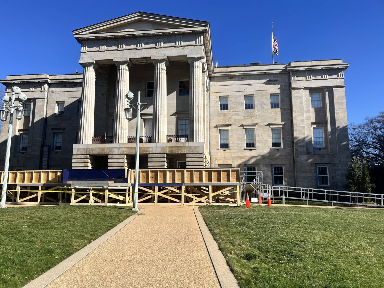 Wide view of a modular aluminum wheelchair ramp structure spanning the North Carolina State Capitol.