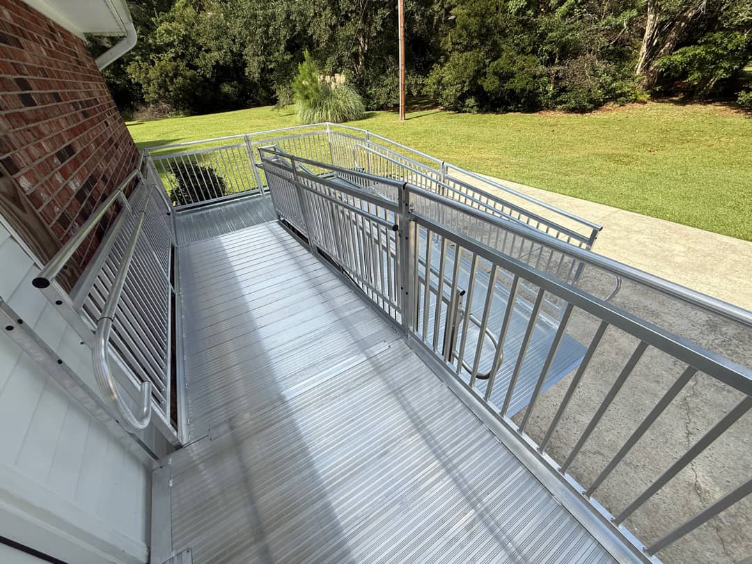 Top-down view of an ADA-compliant modular aluminum wheelchair ramp at the Town of Bolivia NC Town Hall.