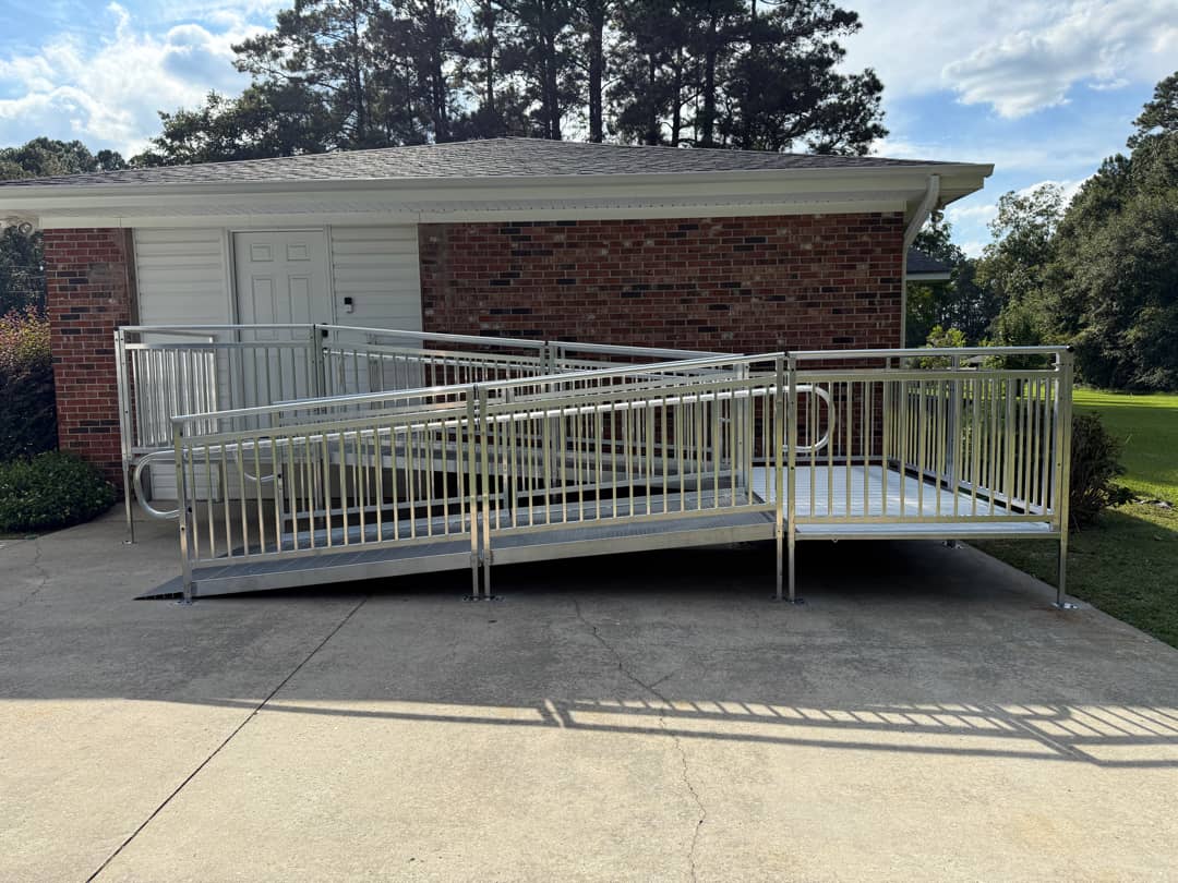 Switchback modular aluminum wheelchair ramp installed outside a government building in Bolivia, NC.