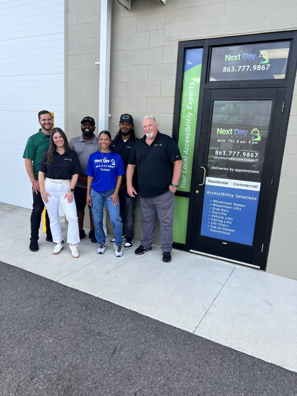 group photo of the next day access knoxville team