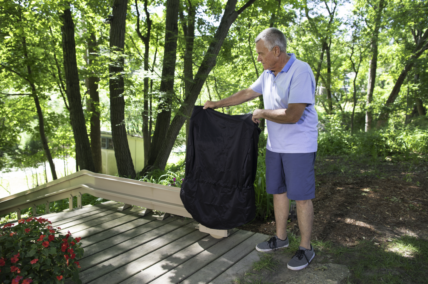 Man covering Bruno outdoor stairlift