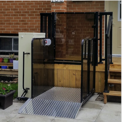 Vertical platform lift attached to porch