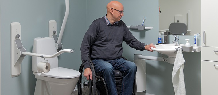 Swing washbasin with wheelchair user 1