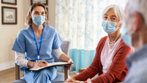 resize photos doctor sitting with a couple of patients